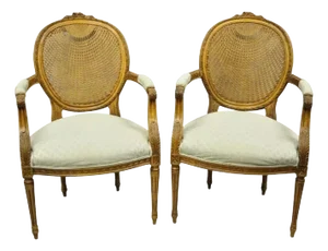 Mid 20th Century Vintage French Country Louis XVI Style Oval Cane Back Walnut Arm Chairs - A Pair