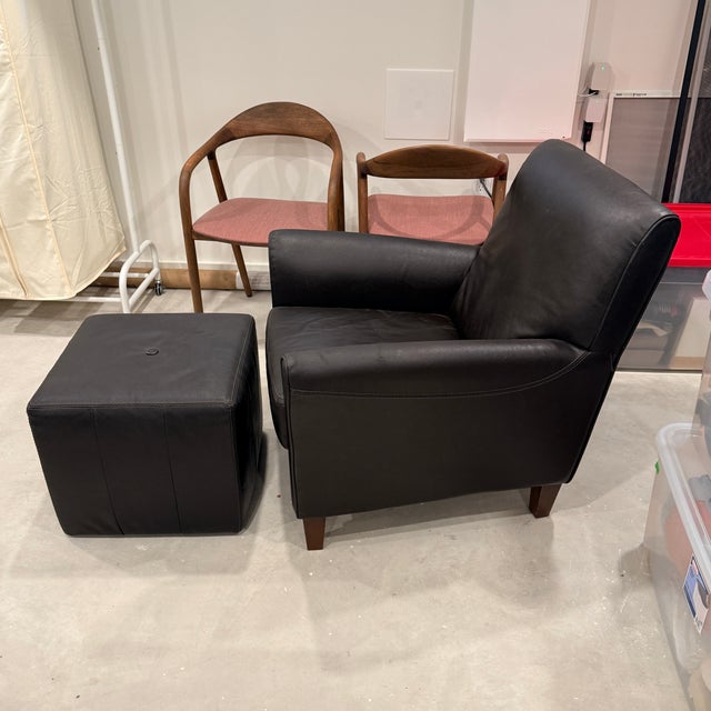 Calia Italian Leather Chair and Ottoman Italian chocolate…and with an ottoman. Matte brown leather with a high back and...