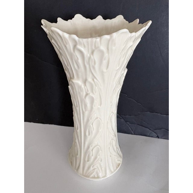 Elegant vintage porcelain vase by Lenox, crafted in the United States and finished in the brand’s signature warm ivory...