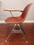 Authentic Charles and Ray Eames fiberglass side shell chair by Herman Miller, with original foam latex upholstery in rust...