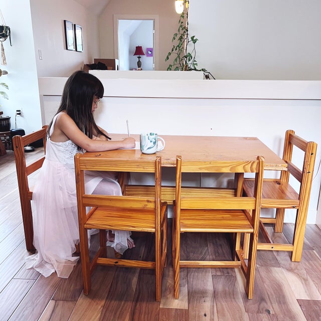 Vintage children’s pine activity table with 4 chairs. Lovely, sturdy condition. There are some paint stains on the surface...