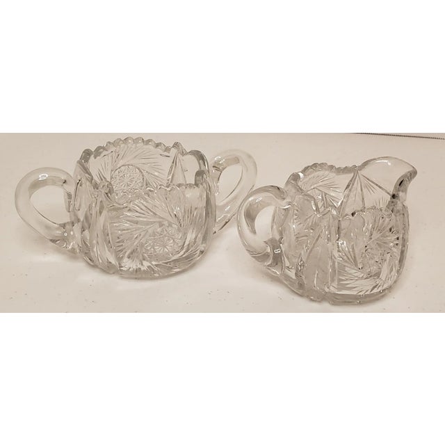 We love this extraordinary antique sugar and creamer set for the sparkling brilliant pattern and quality of the cut glass....