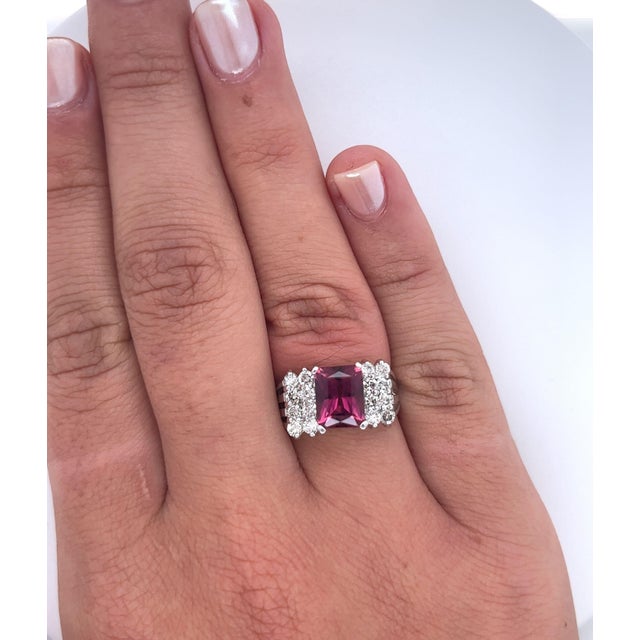 Vintage 3 Carat Radiant Cut Vivid Pinkish Purple Tourmaline Ring. Set in Platinum 950, this semi-precious gemstone ring...
