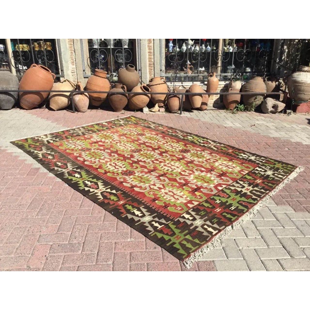 This beautiful, vintage, handwoven kilim is approximately 50 years old. It is handmade, of very fine quality hand spun...
