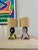 Ceramic legs (one satin black and yellow - the other satin black and pink). In excellent condition - no snags. 1950s. New...