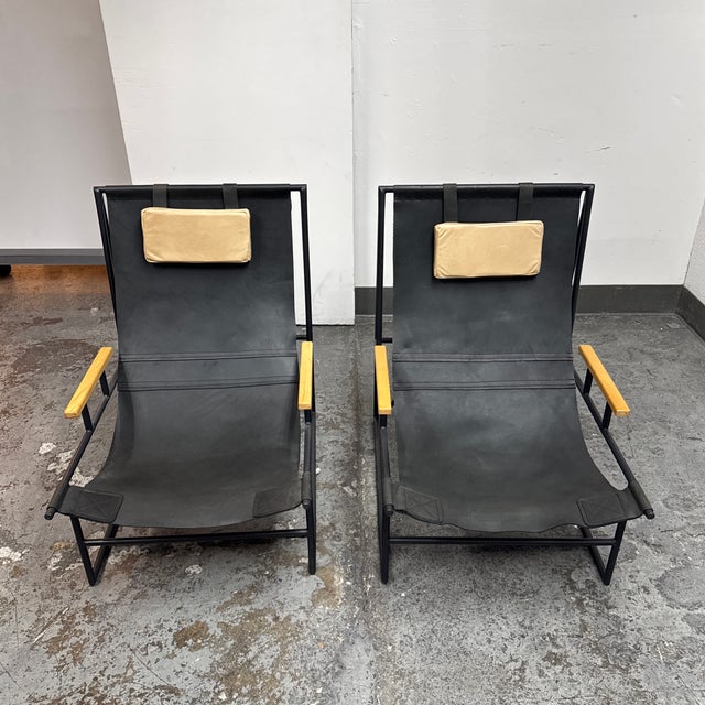 Design Plus Gallery presents a Pair of Judson Sling Lounge Chairs from Four Hands. These low-profile lounge chairs pair...