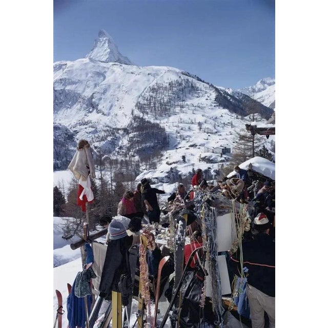 Zermatt Skiing 1968 by Slim Aarons Slim Aarons Limited Estate Edition The apres-ski in Zermatt, Switzerland, March 1968....