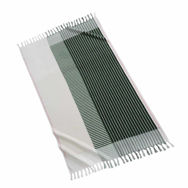 A fresh take on classic geometric motifs, our Nomade collection elevates any beach day with its warm color palette and...