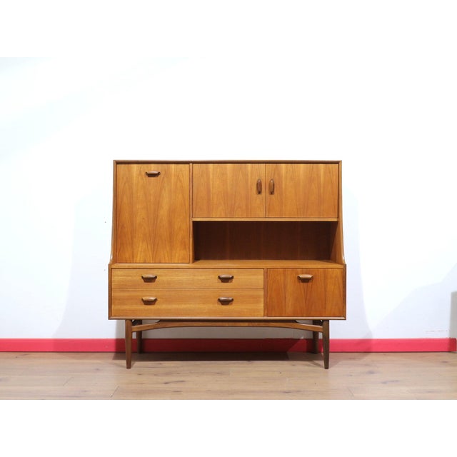 Introducing the Mid Century Modern Teak Brasilia Sideboard Tall Credenza Buffet by G Plan, a stunning piece from the...