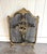 Early 20th-century Victorian style brass floral bouquet folding fireplace screen. Excellent condition. Measures 29" tall...