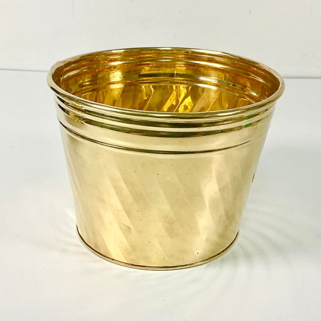 There is nothing more gorgeous than a lush green plant in a brass planter. It's classic, iconic and oh so old Hollywood....