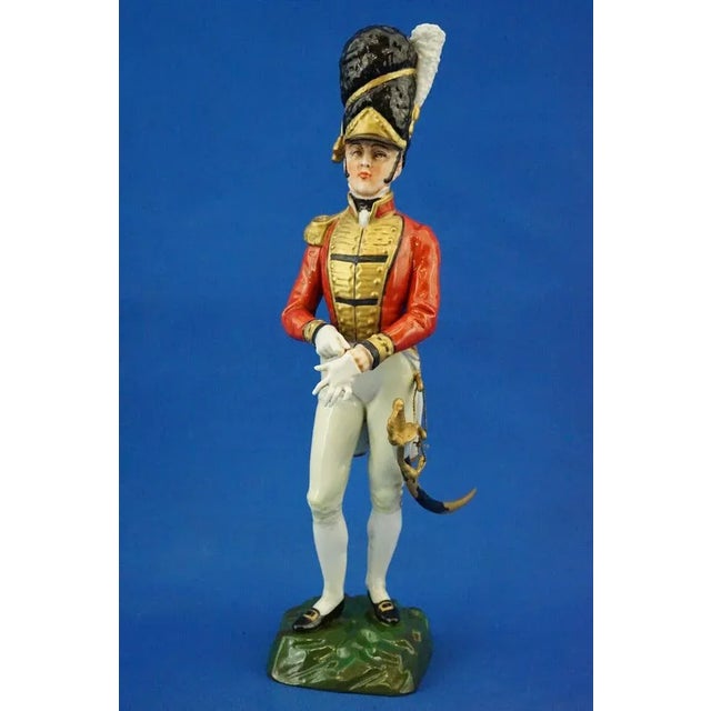 Item description: Beautiful sculpture in vitrified hard-paste porcelain, entirely decorated by hand, depicting an officer...