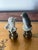 Two cute little critters porcelain figurines mounted on brass bases as lamp finials.