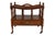 A colonial style canterbury in mahogany, circa 1940, made by Columbia Manufacturing Company. The elegant frame is carved...