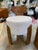 This striking pair of sculptural solid-wood frames with softly curved backrests, paired with newly reupholstered seats in...