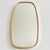 Cool mid-century asymmetrical brass mirror from the 50s. Looks great in a retro interior or in the hall. The retro wall...