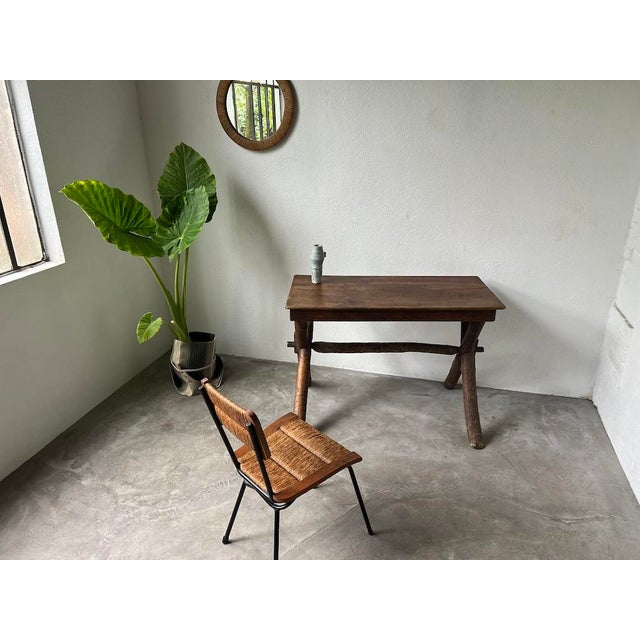 Unique piece, desk made by a savoyard craftsman around 1900. Unique with its natural tree trunk base and its small shelves...