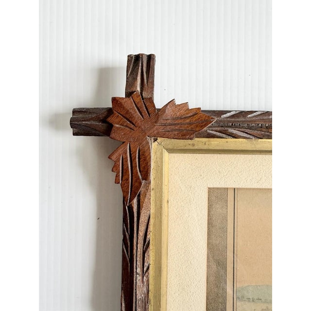 Beautiful antique print in an Adirondack style frame.