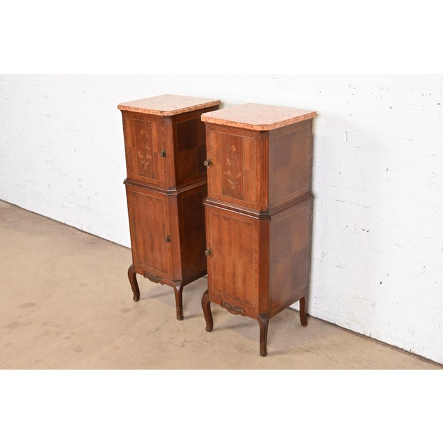 A gorgeous pair of French Louis XV style lingerie chests or tall beside chests France, Circa 1920s Beautiful kingwood and...