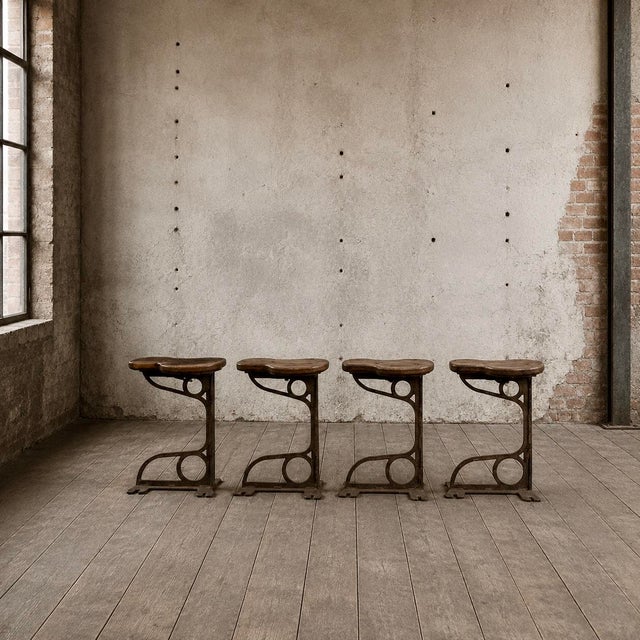 Characterful set of four machinist stools, likely late Victorian to early 20th century (circa 1900). Each stool has a...