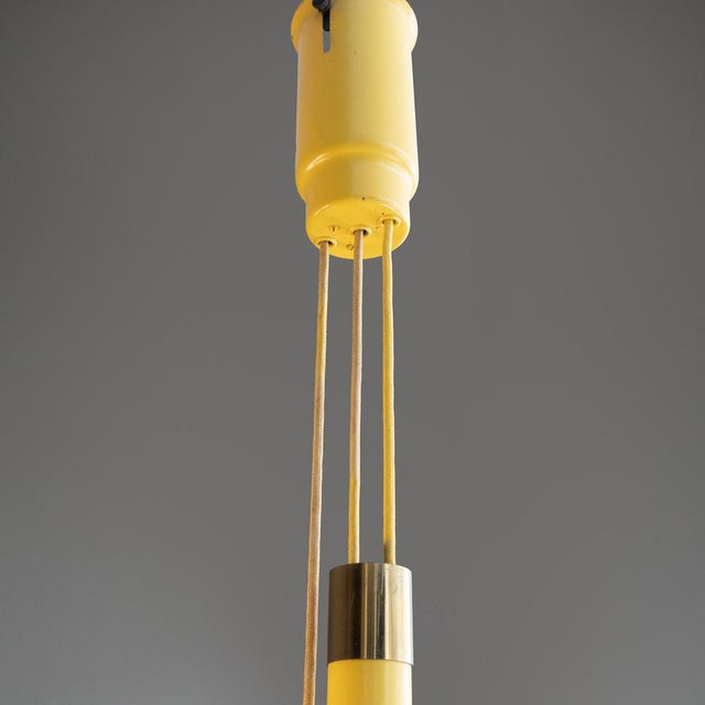 Extendable Pendant Lamp in Yellow Metal and Plastic, 1970s, in Very Good conditions. Designed 1970 to 1979 Up to 250V...