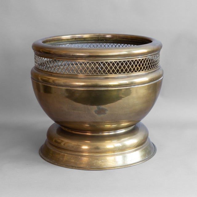 Large Edwardian brass jardinière with pierced rim. Signs of age. French circa 1920.