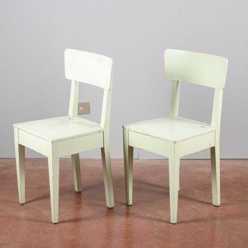 Discover this rare pair of modern storage chairs, a charming example of functional period design. The chairs are...