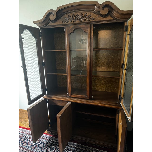 A stunning statement piece for any traditional or transitional dining room. This china cabinet showcases all the hallmarks...