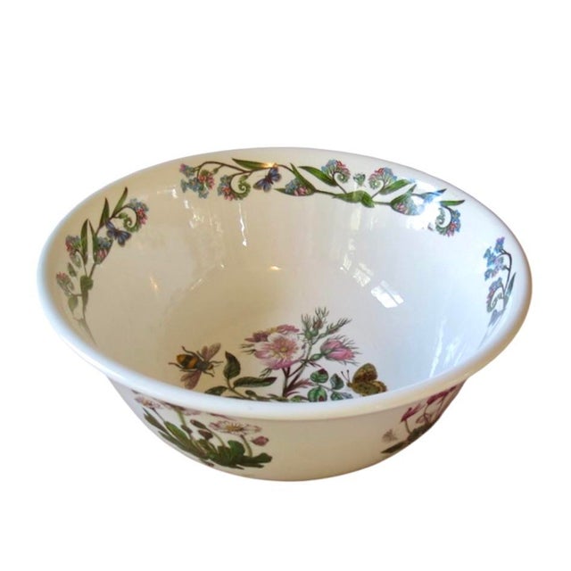 A charming, large Portmeirion serving bowl. Features a center Rosa Canina /Dog Rose with various florals encircling the...