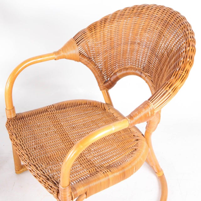 Lovely pair of wicker armchairs from the seventies. Comfortable and in good condition.