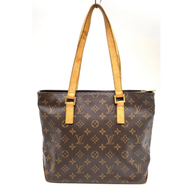 Classic Louis Vuitton Cabas Piano M51148 tote in the iconic Monogram canvas with natural cowhide leather trim and gold-...