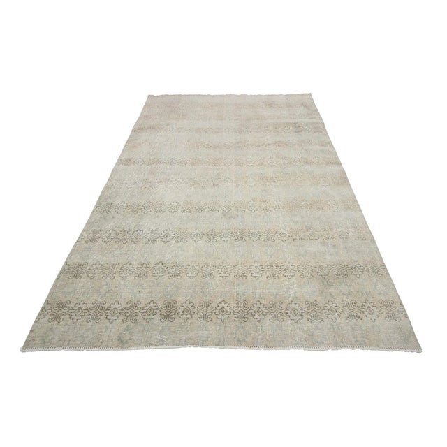 Washed Out vintage handknotted rug from Oushak region of Turkey. Approximately 50-60 years old. In very good condition