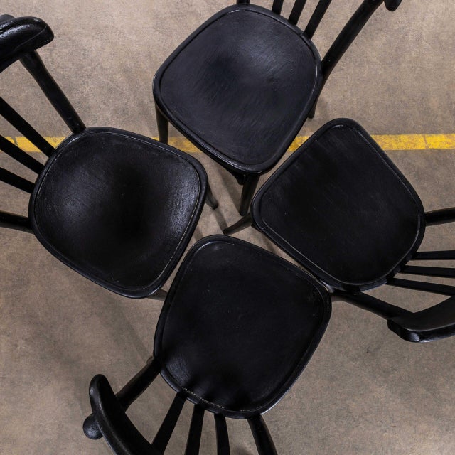 1940’s Tall Dark Oak Bentwood Dining Chairs – Set Of Four. The process of steam bending beech to create elegant chairs was...