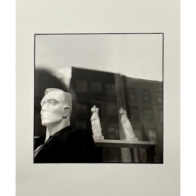Bruce Cratsley, American (1944-1998) Vintage gelatin silver print Connections A surrealist image of a mannequin in a store...