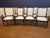 This is a set of eight ( 2 arms and 6 sides) Newport mahogany dining chairs by Leighton Hall. They feature acanthus leaf...