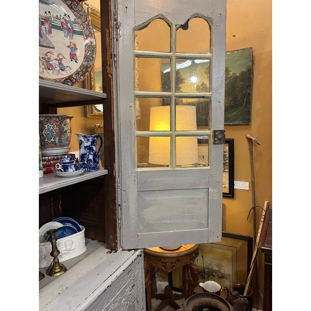 French Blue/Gray Painted cabinet. Two pieces and crown comes off. Inside is original brown oak. Please note is does have...