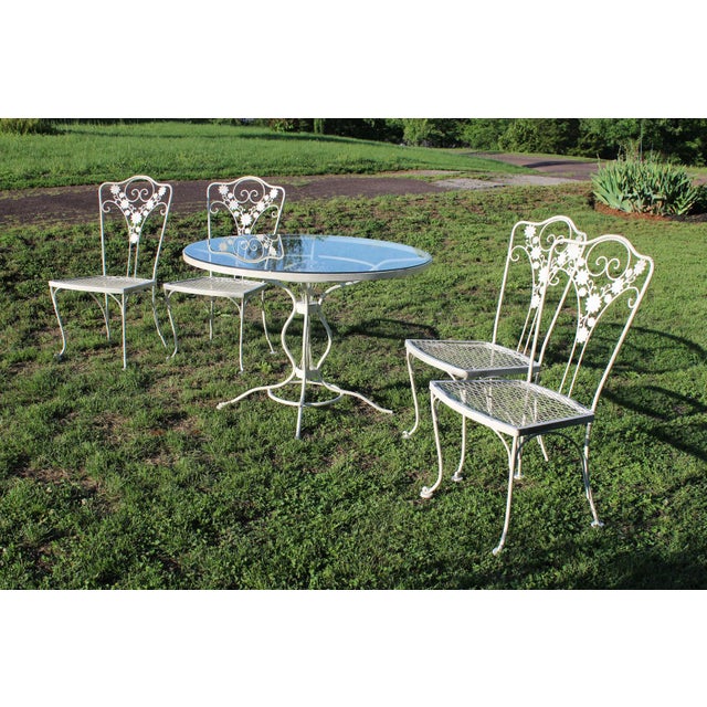 Vintage Lee L. Woodard & Sons Wrought Iron White Patio Set—A Table and Four Chairs For Sale - Image 17 of 18