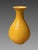 Monochrome yellow porcelain vase - China, Qing Dynasty. Yellow glazed porcelain with underglaze incision depicting a...