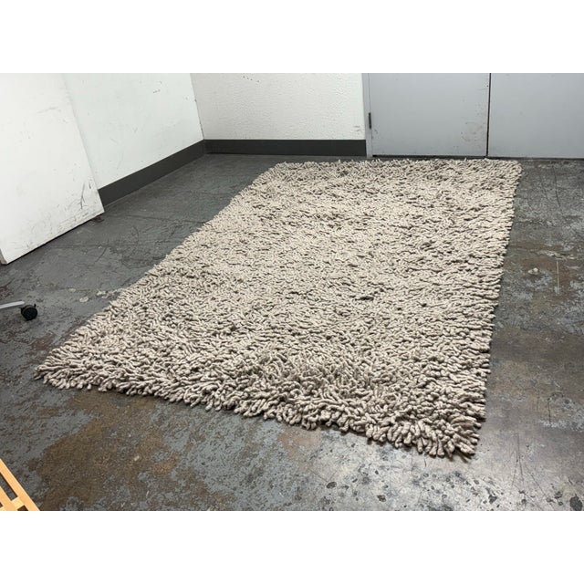 Design Plus Gallery presents a 6ft5in × 9ft8in Design Within Reach Nesta Shag Area Rug. Kick off your shoes and take a...