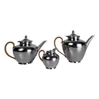 Mid-20th Century Pewter Tea Set with Rattan Wrapped Handlers from Gras et Etienne, 1950s, Set of 3 For Sale