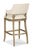 A curved upholstered back with descending curved arms over an upholstered seat elevated by tapering saber legs. Materials:...