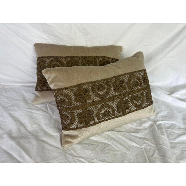 Pair of custom pillows made with 19th century French lace and taupe colored mohair velvet fronts. Down inserts, hidden...
