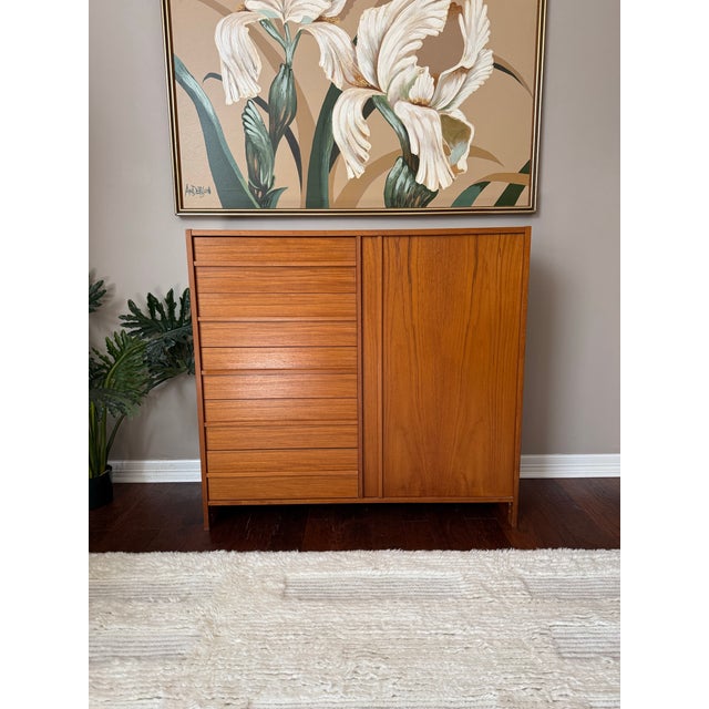 Gorgeous teak chifforobe or tallboy/highboy imported from Denmark. Features five drawers on the left side with jointed...