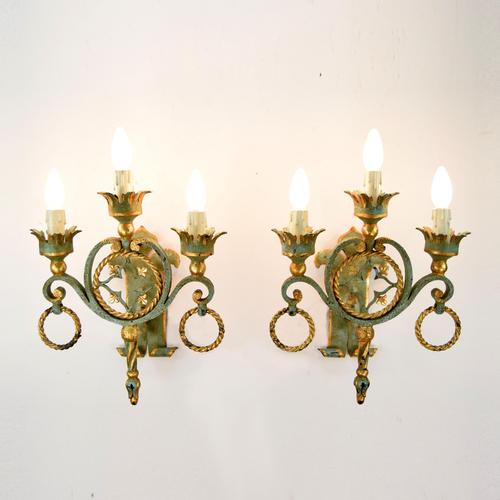 A pair of beautiful hand-forged wall lamps. Due to their Gothic design and the colorful combination of gold and blue, they...