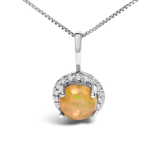 Adorn your neckline with the exquisite allure of this 10K white gold pendant necklace, where the warmth of the metal...