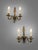 Beautiful pair of antique French wall lights. These bronze double-fitting sconces feature lovely foliage and scroll detail...