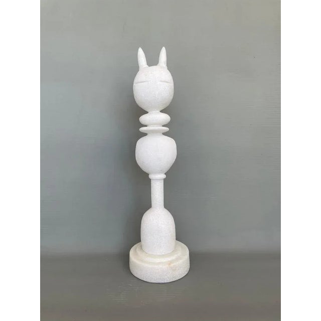 Cat King marble sculpture by Tom Von Kaenel Dimensions: D15 x H53 cm Materials: Marble Tom von Kaenel, sculptor and...