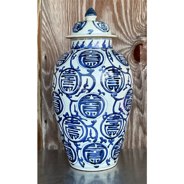 Presenting our Vintage Asian Medallion Glazed Ceramic Lidded Jar: a striking decorative piece that exudes elegance and...