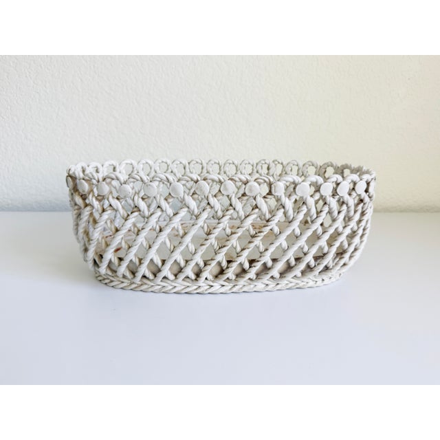 This large-scale, oval-shaped braided rope centerpiece bowl or basket is a rare piece of Italian ceramic creamware from...