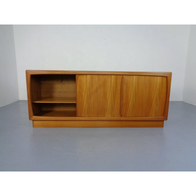 Sideboard by Dyrlund in teak. 6 drawers. Sliding doors on the left and right. Behind each door is a shelf. Very nice,...